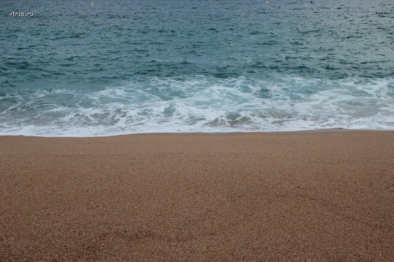 Песок на пляже