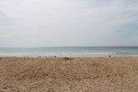 Песок на пляже Карон